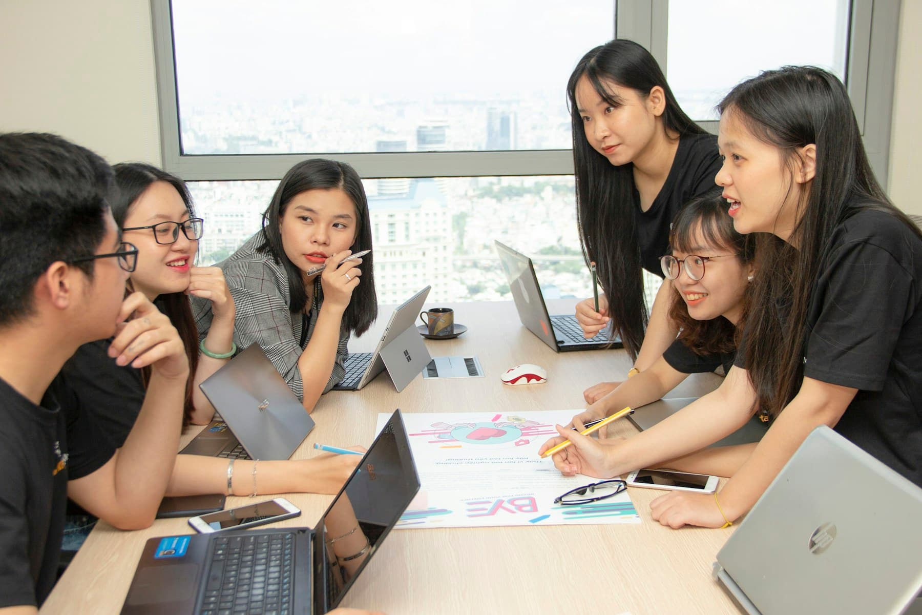 A regional team working together around a table